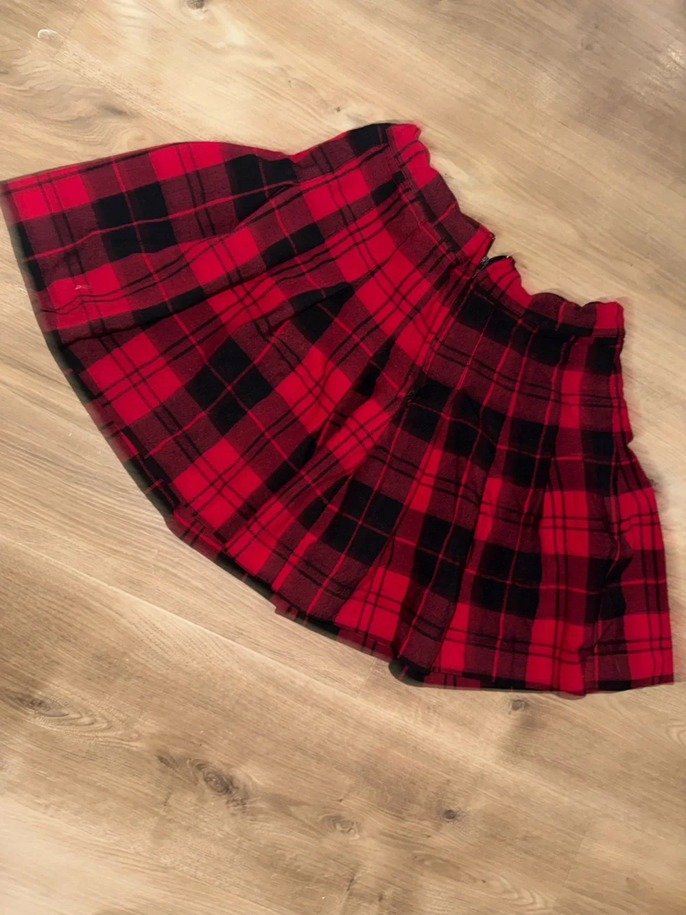 Red and black plaid skirt.